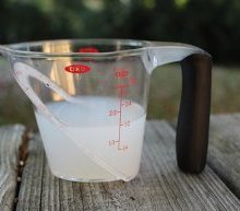 Measuring Cup with Carpet Cleaning Liquid
